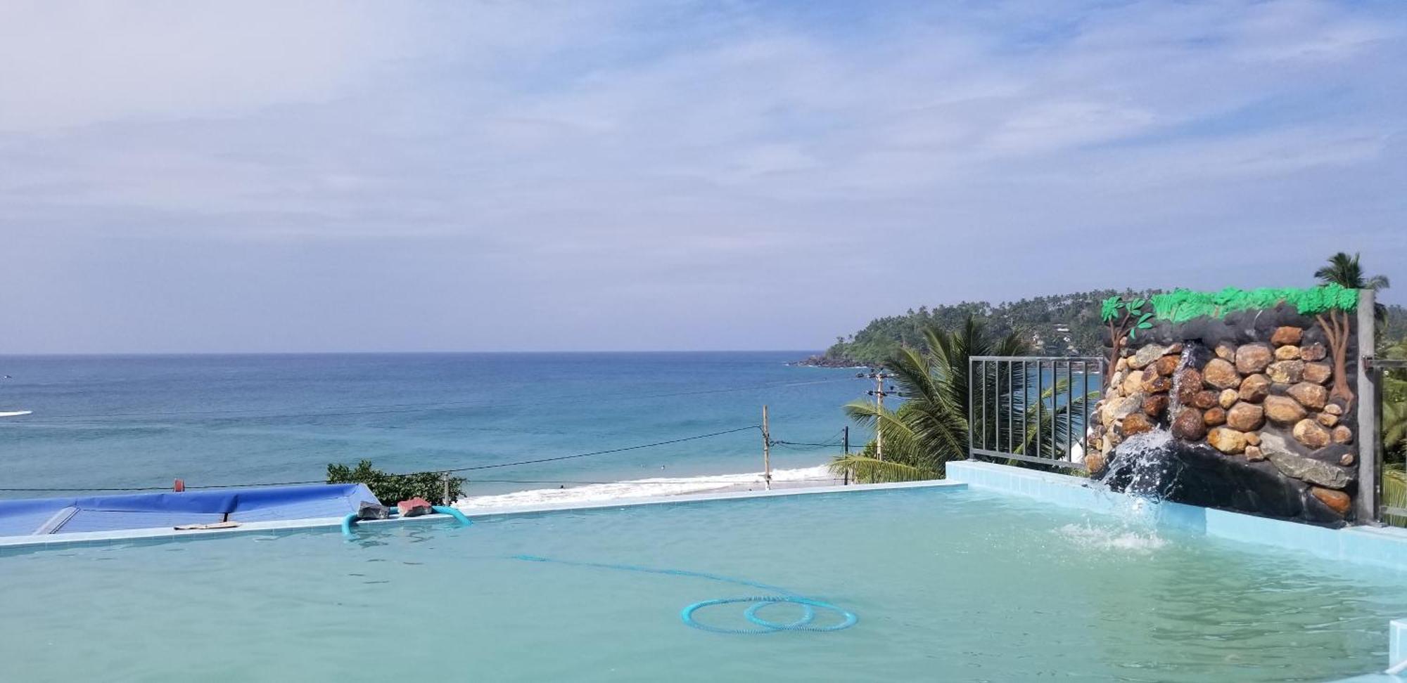 One World Mirissa Hotell Rom bilde
